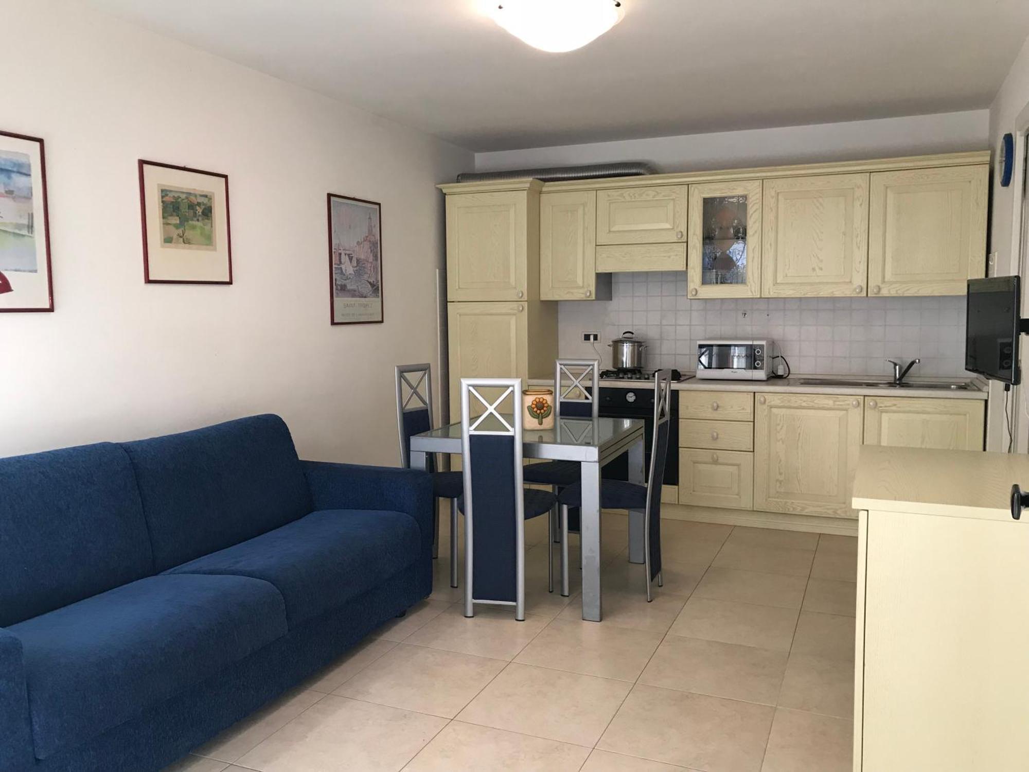 Costa Azzurra Apartment Grado Bilik gambar